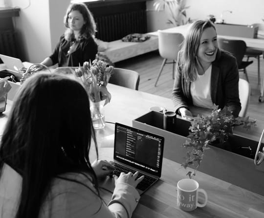 Group of people working on a table