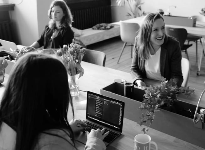 Group of people working on a table